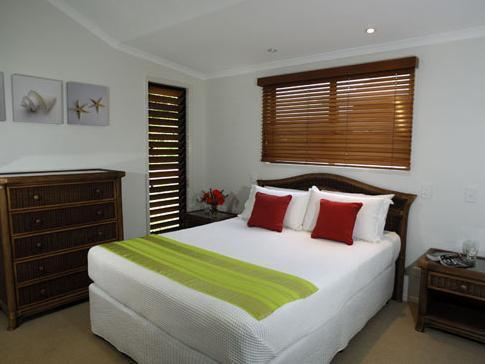 Tin Can Bay Marina Villas Buitenkant foto